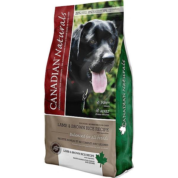 Dog food package with a black dog on the label, featuring the brand 'Canadian Naturals'.
