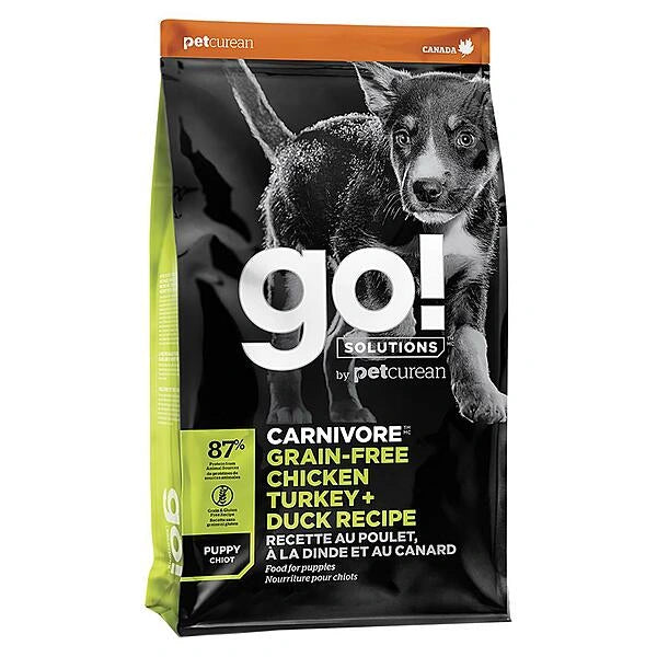 Dog food package with 'go!' branding and a puppy on a black background