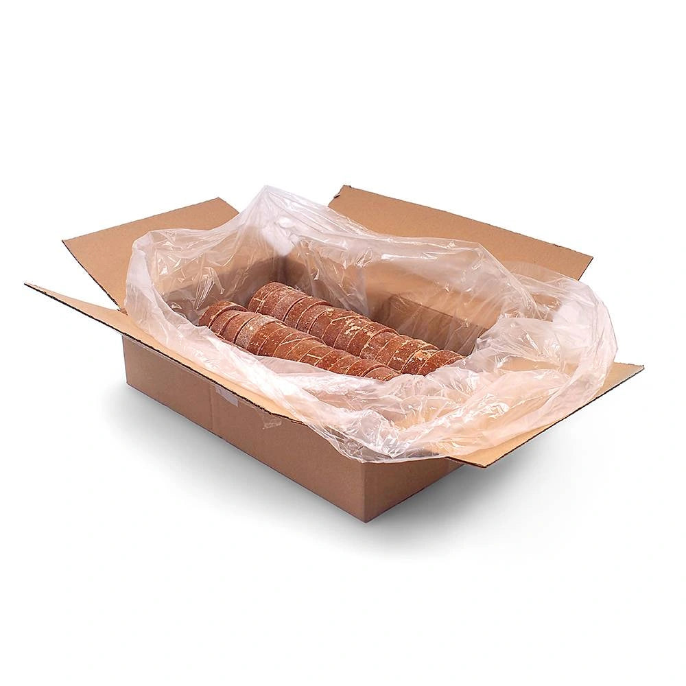 Cardboard box with plastic wrap containing raw beef-turkey patties on a white background