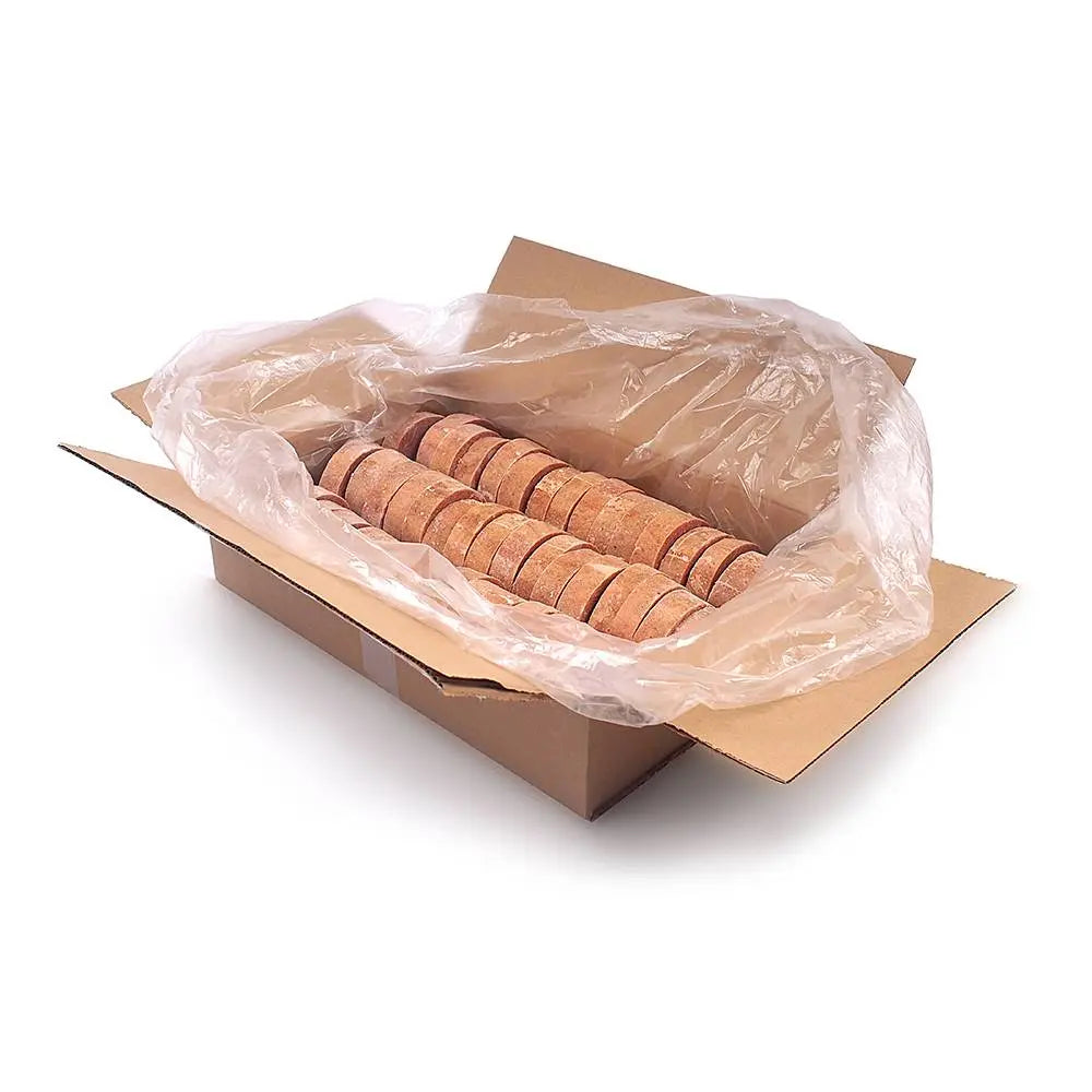 Cardboard box with plastic wrap containing wooden discs on a white background