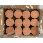 Packaged raw dog food shaped in patties in a clear plastic wrap