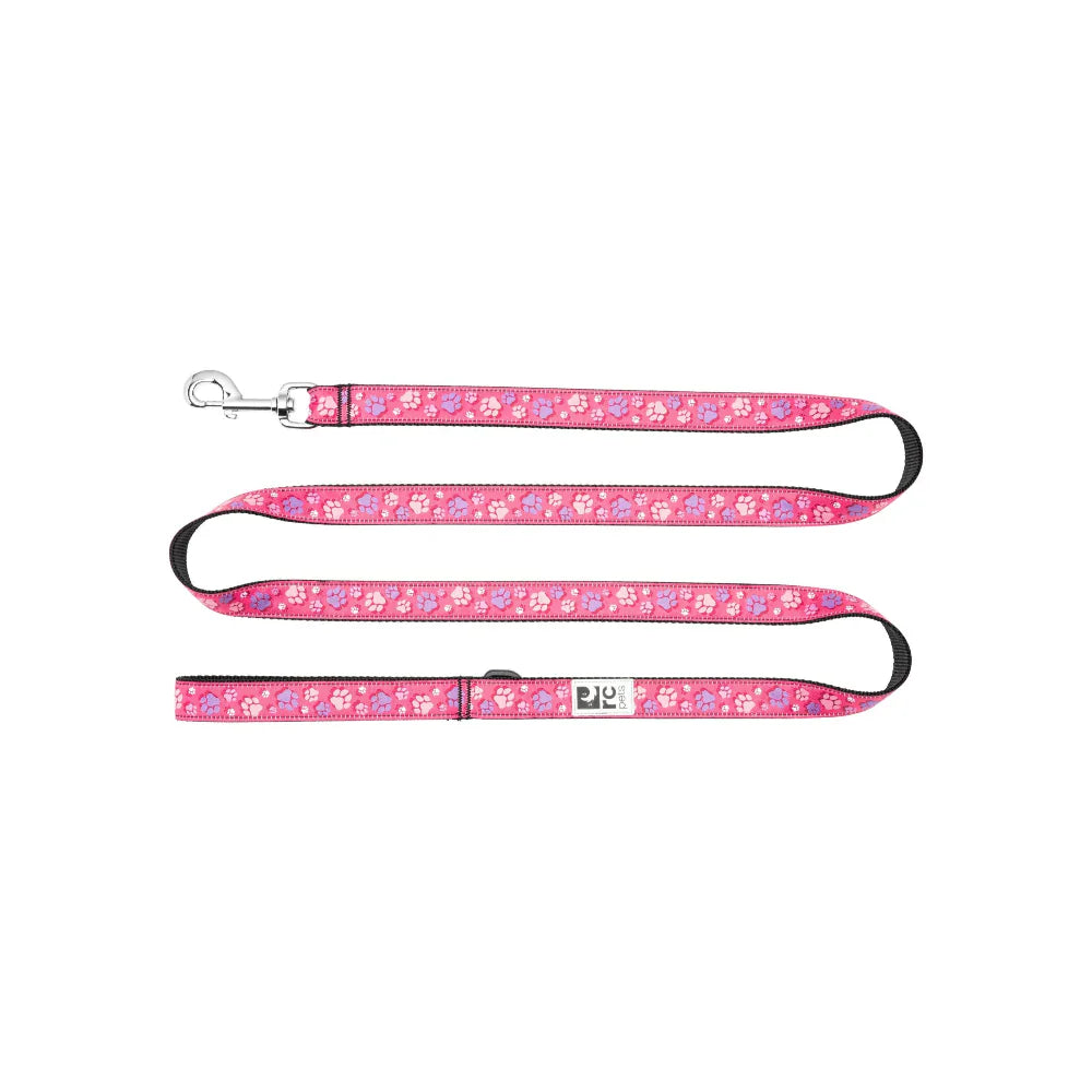 Pink floral patterned dog leash on a white background