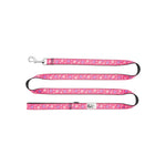 Pink floral patterned dog leash on a white background